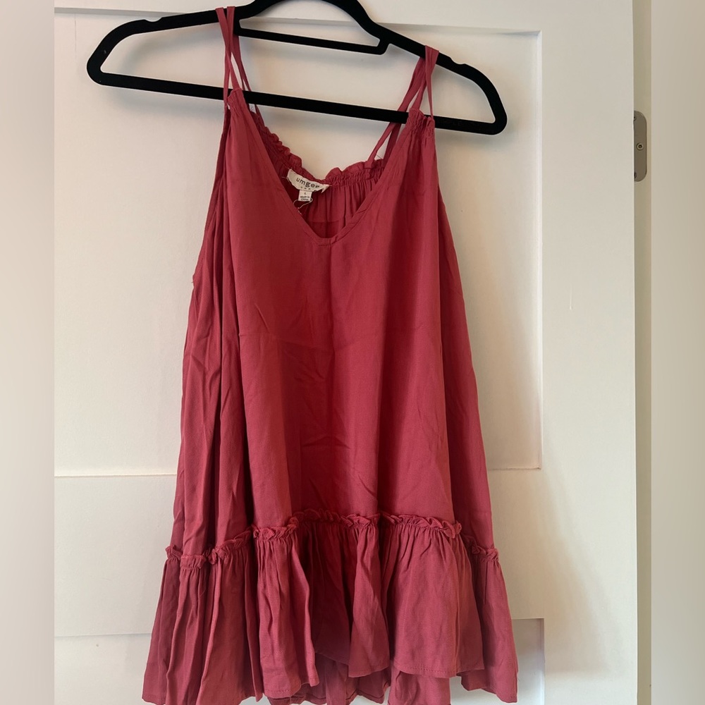 Fun flirty rose colored top.